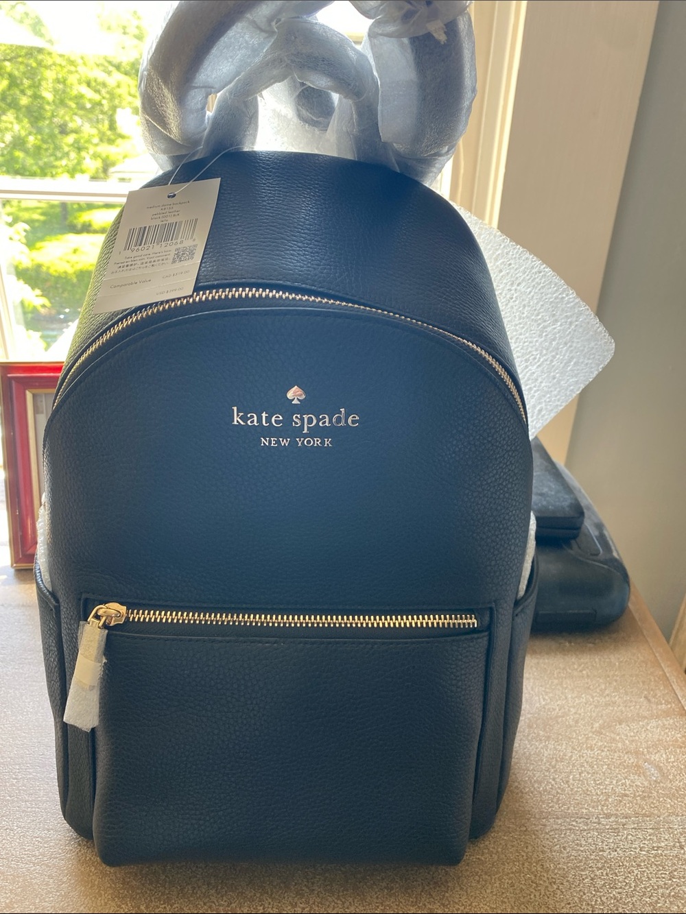 kate spade Black Pebbled Leather Mini Backpack with Gold Hardware